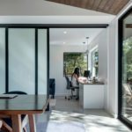 Female work from home office with wall slide pocket glass door