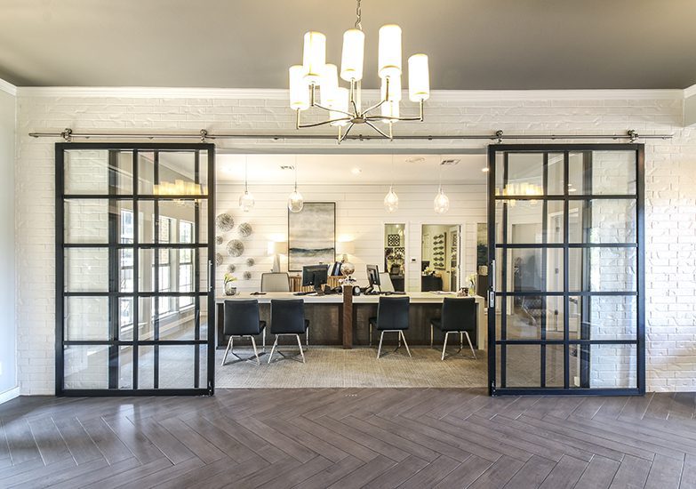 Glass barn doors in an office space
