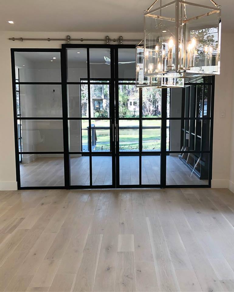 Double-Suspended-Barn-Door-over-Fixed-Panels-Black-or-Charcoal-Clear-Quattro-Continental-Closed