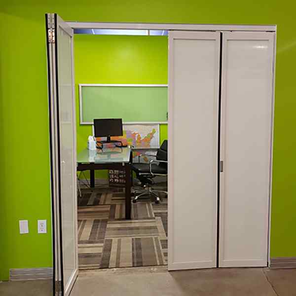 white glass bi-fold doors for a private office