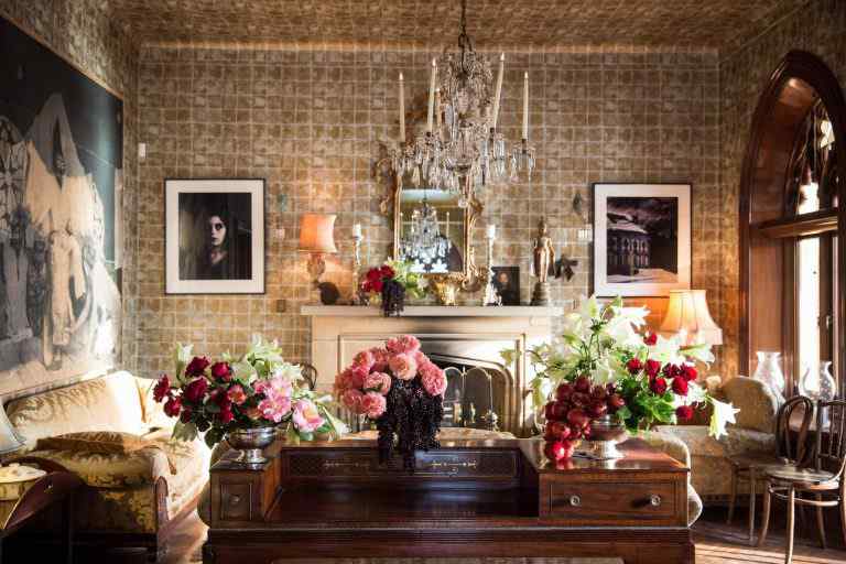 bunches of flowers on brown wooden desk