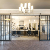 Barn-door-black-frame-clear-glass-continental-with-fixed-panels