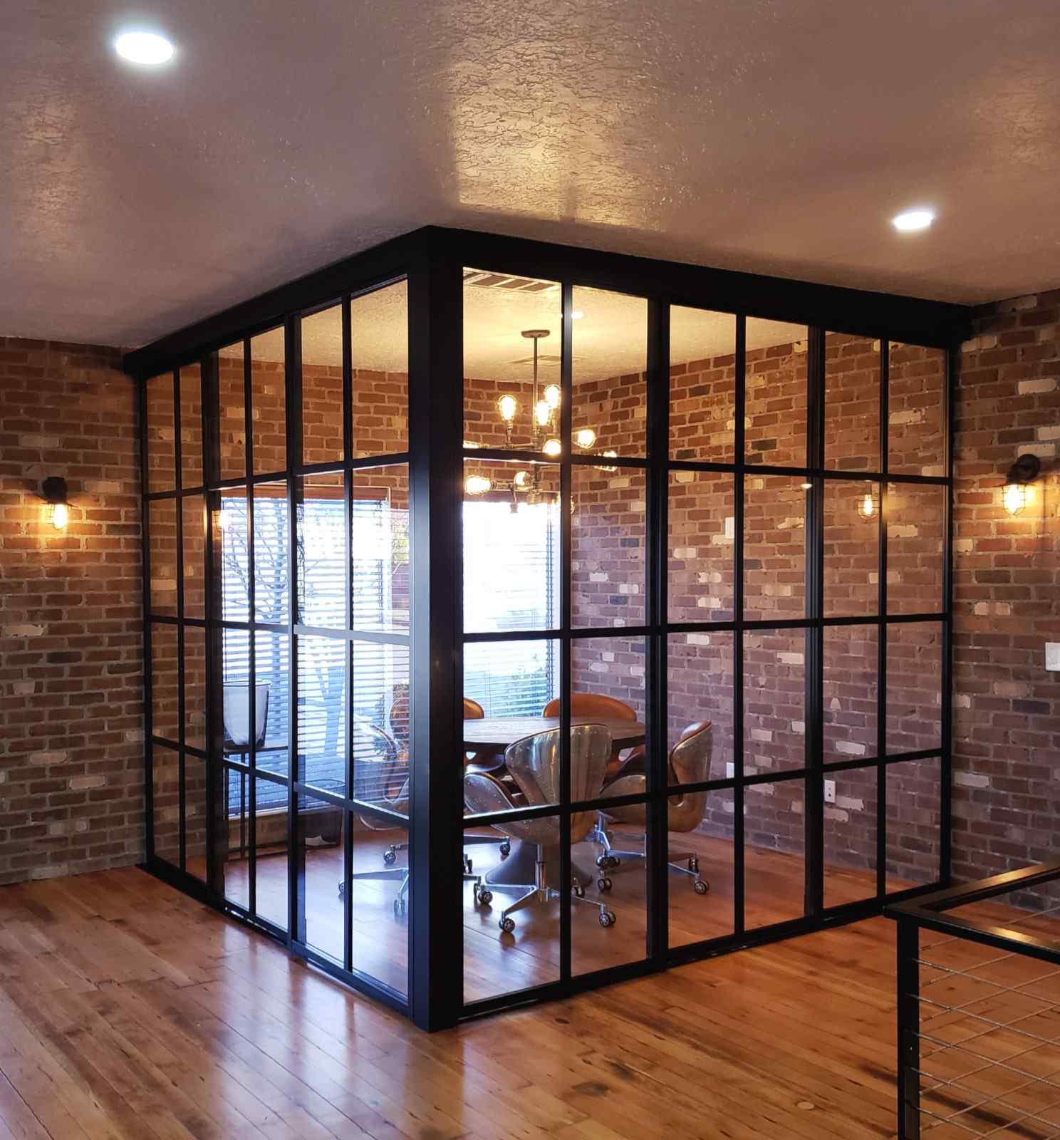 clear glass black frame L shaped room divider closed