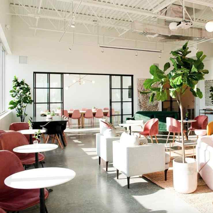 conference room with glass slide doors and pink chairs