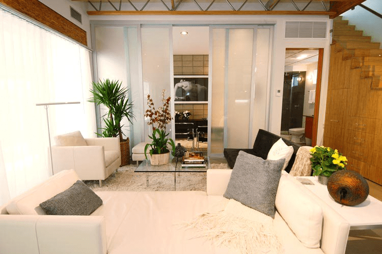 living room with glass wall dividers