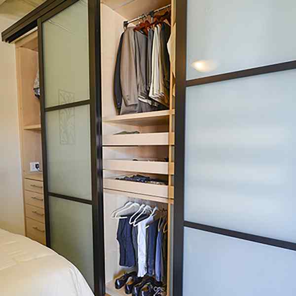 A modern double sliding closet doors with shelves