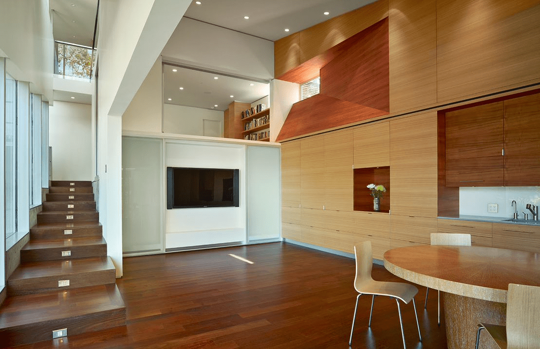 modern living room with wooden floor and stairs
