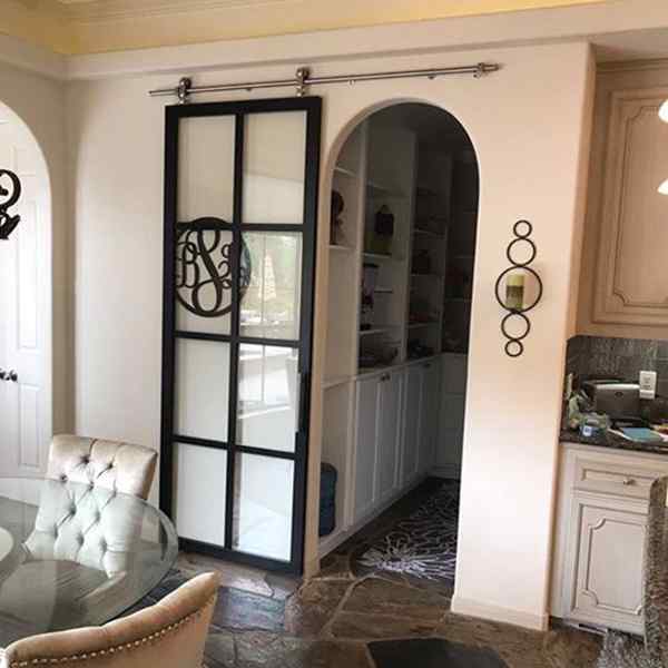 suspended barn door black frame clear glass kitchen home